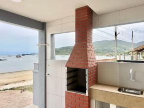 Pé na areia! Aconchegante casa frente Mar! CO02I